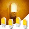imageL LOHAS LED Night Lights Plug into Wall 4 Pack LED Night Light with Light Sensors 3060LM Nightlights for Kids Room Soft White 3000K 06W Automatic Plug in Wall Light for Bedroom HallwayAmber